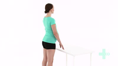 Pregnancy half squat facing t...